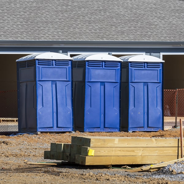 what is the cost difference between standard and deluxe porta potty rentals in Chester Hill